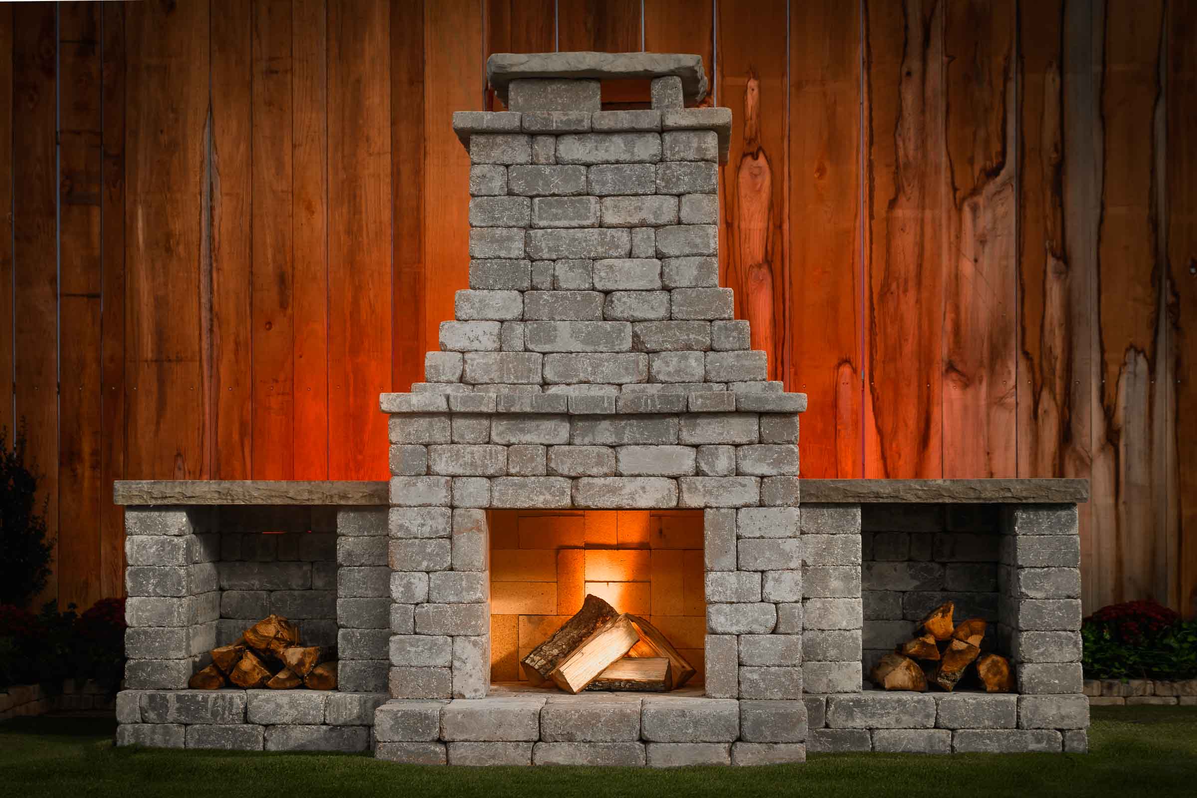 Fremont II outdoor fireplace kit with wood boxes Charcoal Blend